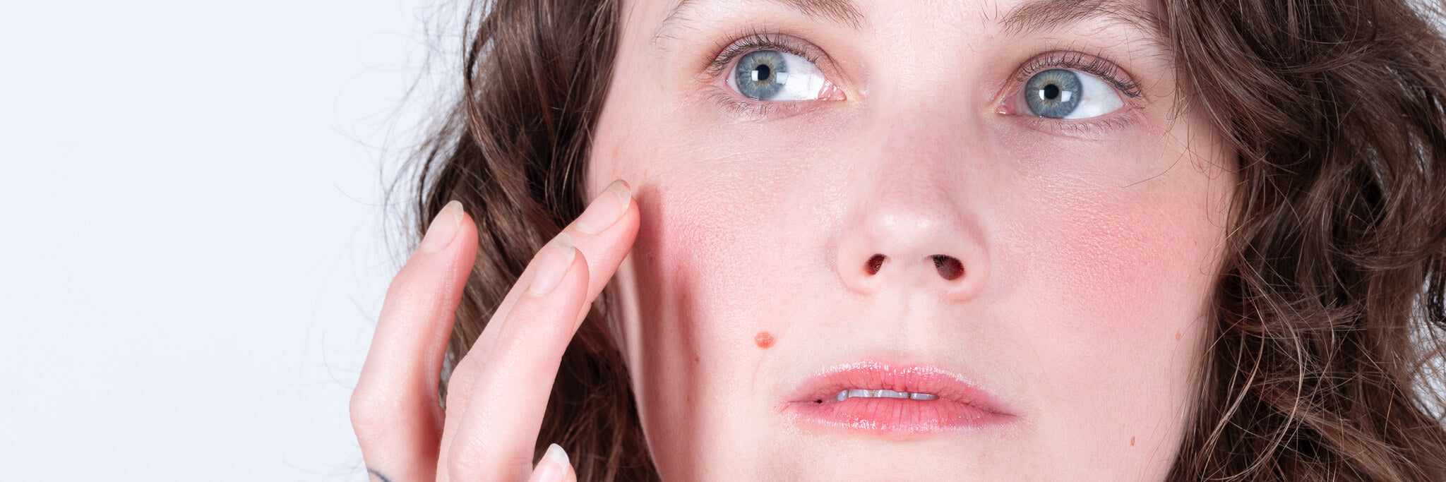 Steph applying all natural lip & cheek tint to her rosy cheeks.