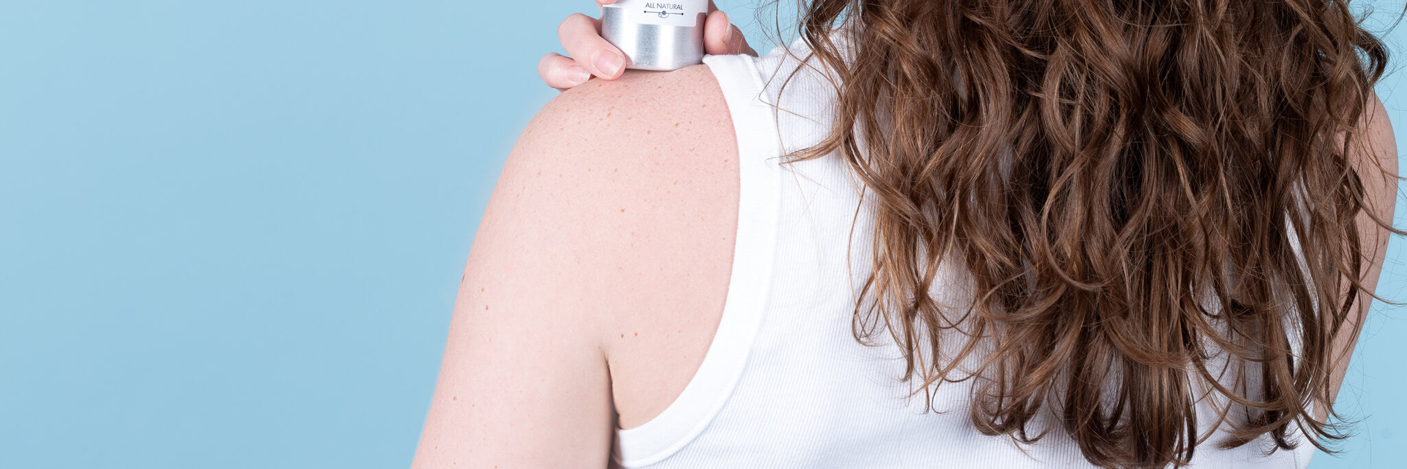 Steph's styled curly hair.