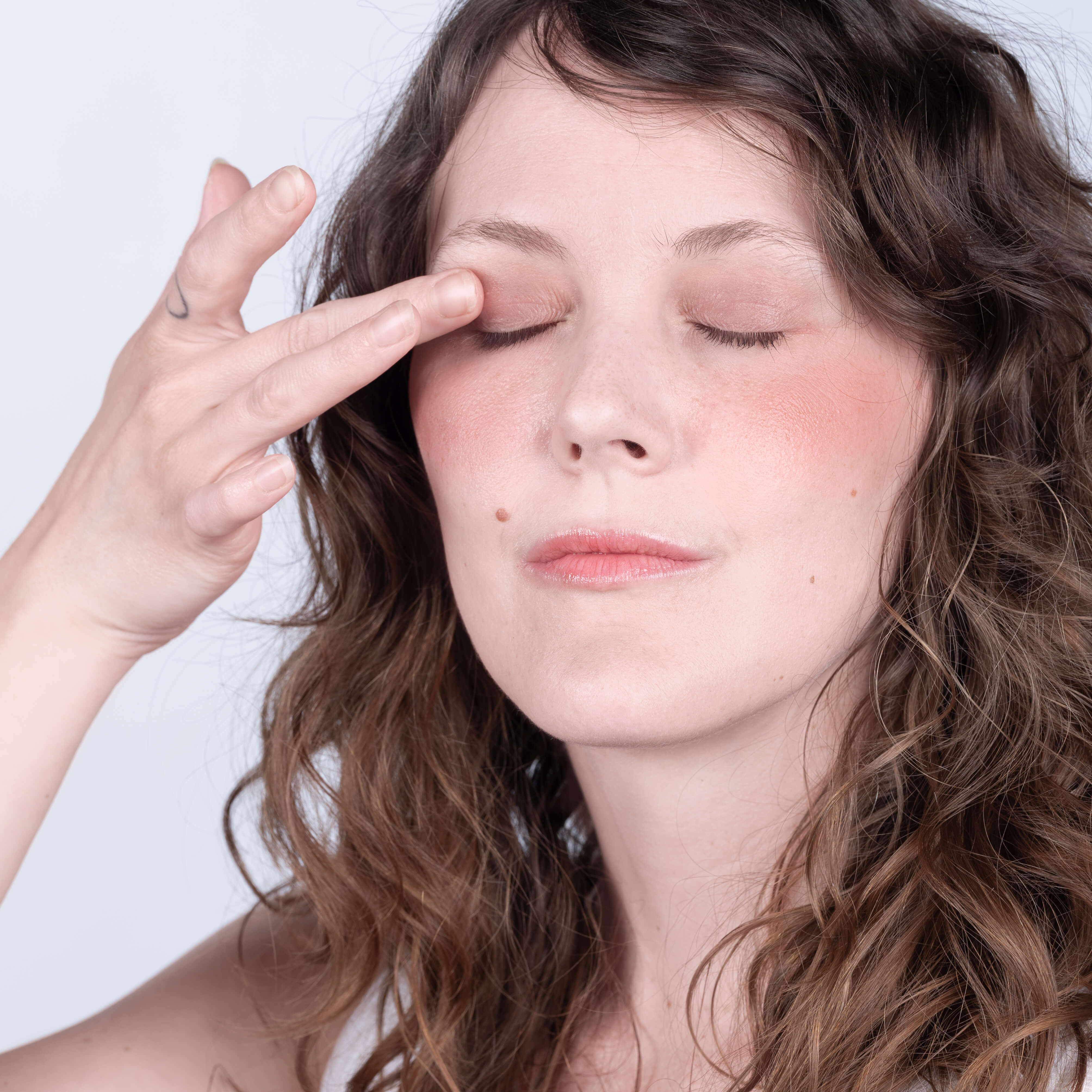 Stephanie using all natural lip tint as an eye shadow.