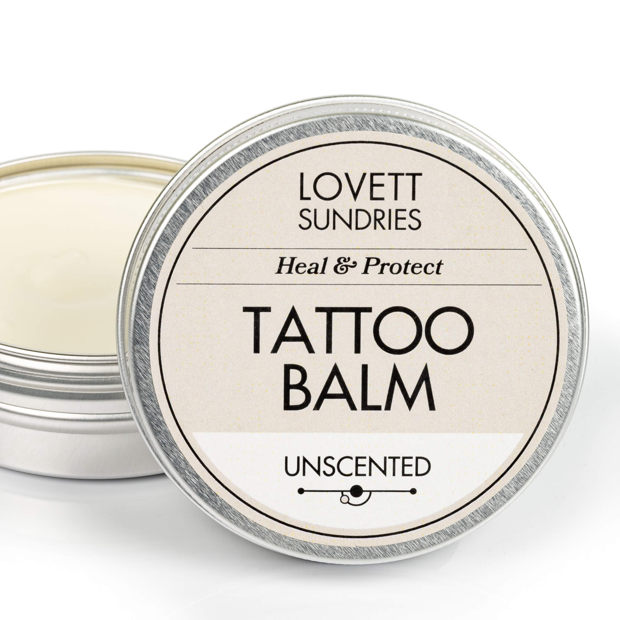 All natural unscented zero waste tattoo balm that heals and protects in a recyclable aluminum tin.