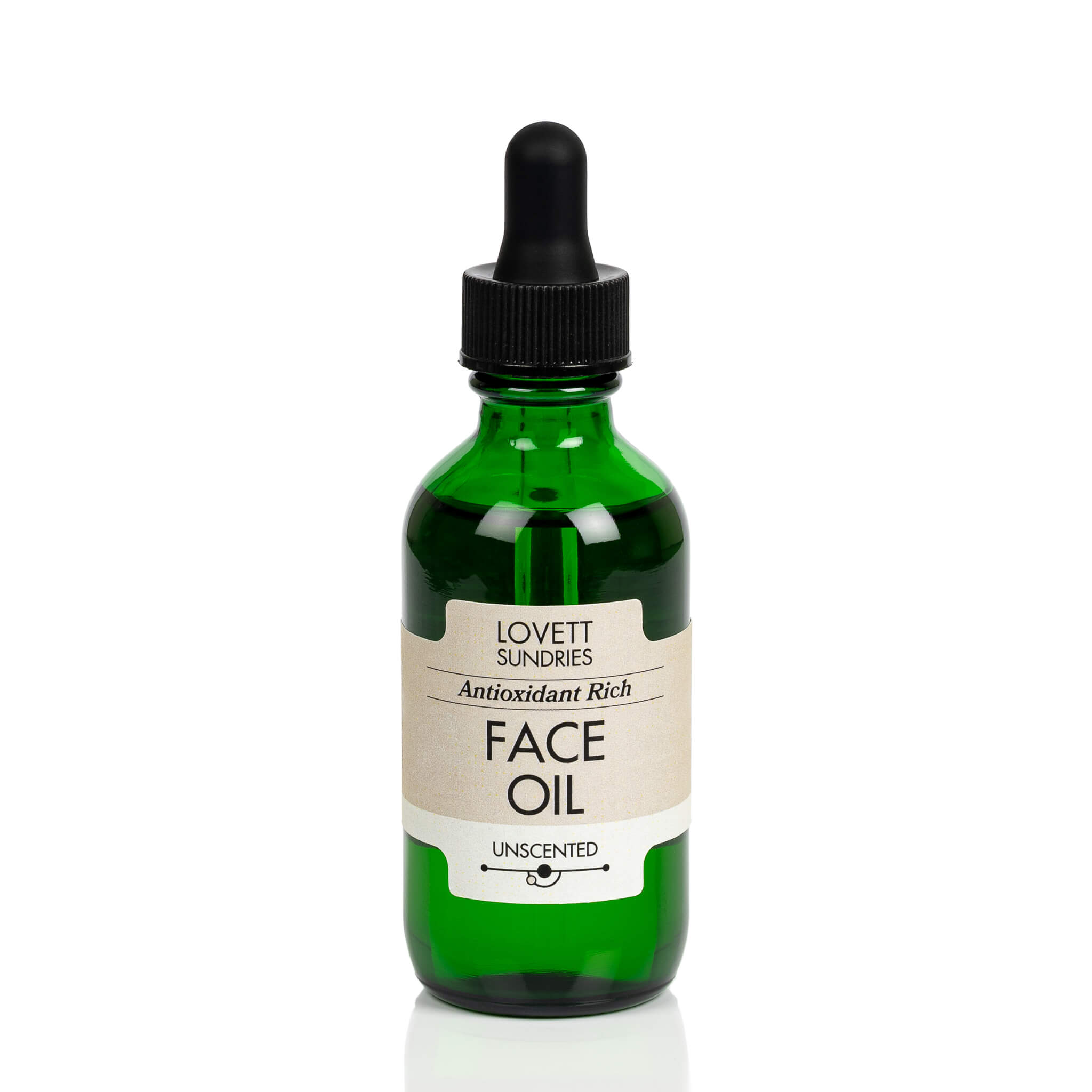 All natural antioxidant rich unscented face oil in a green glass jar with a dropper. 