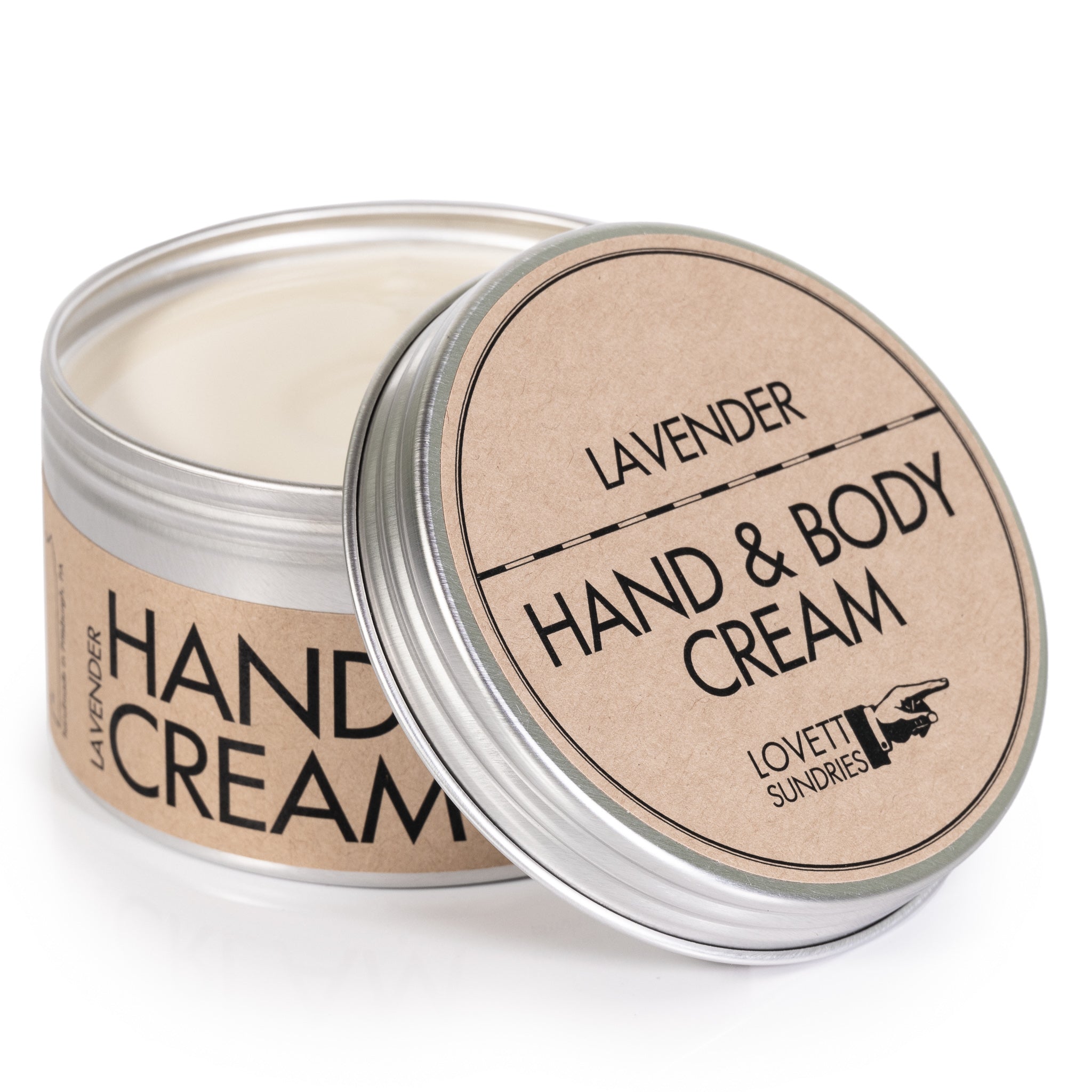 An open screw-top tin with kraft paper label containing rich Lavender Hand & Body cream.