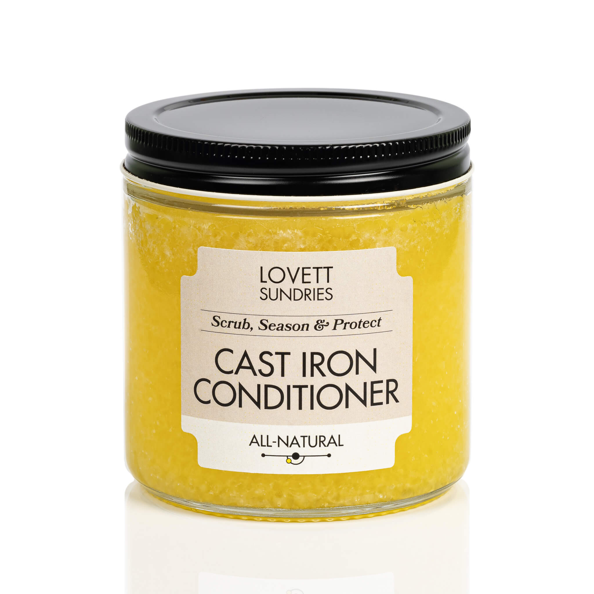 Cast iron conditioner for seasoning, cleaning, and protecting cast iron cookware in a glass jar. 