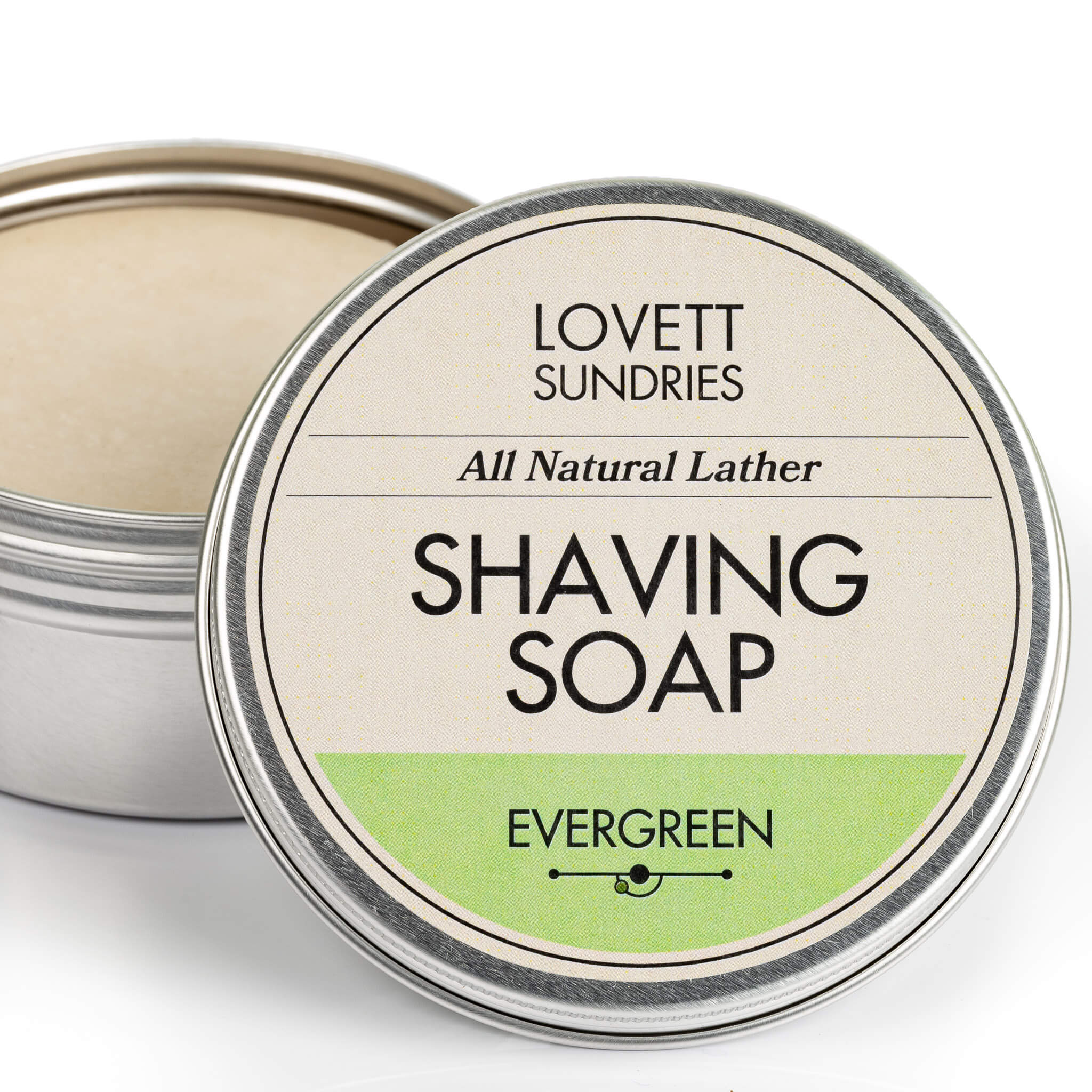 All natural good lathering evergreen scented shaving soap in a recyclable aluminum tin.