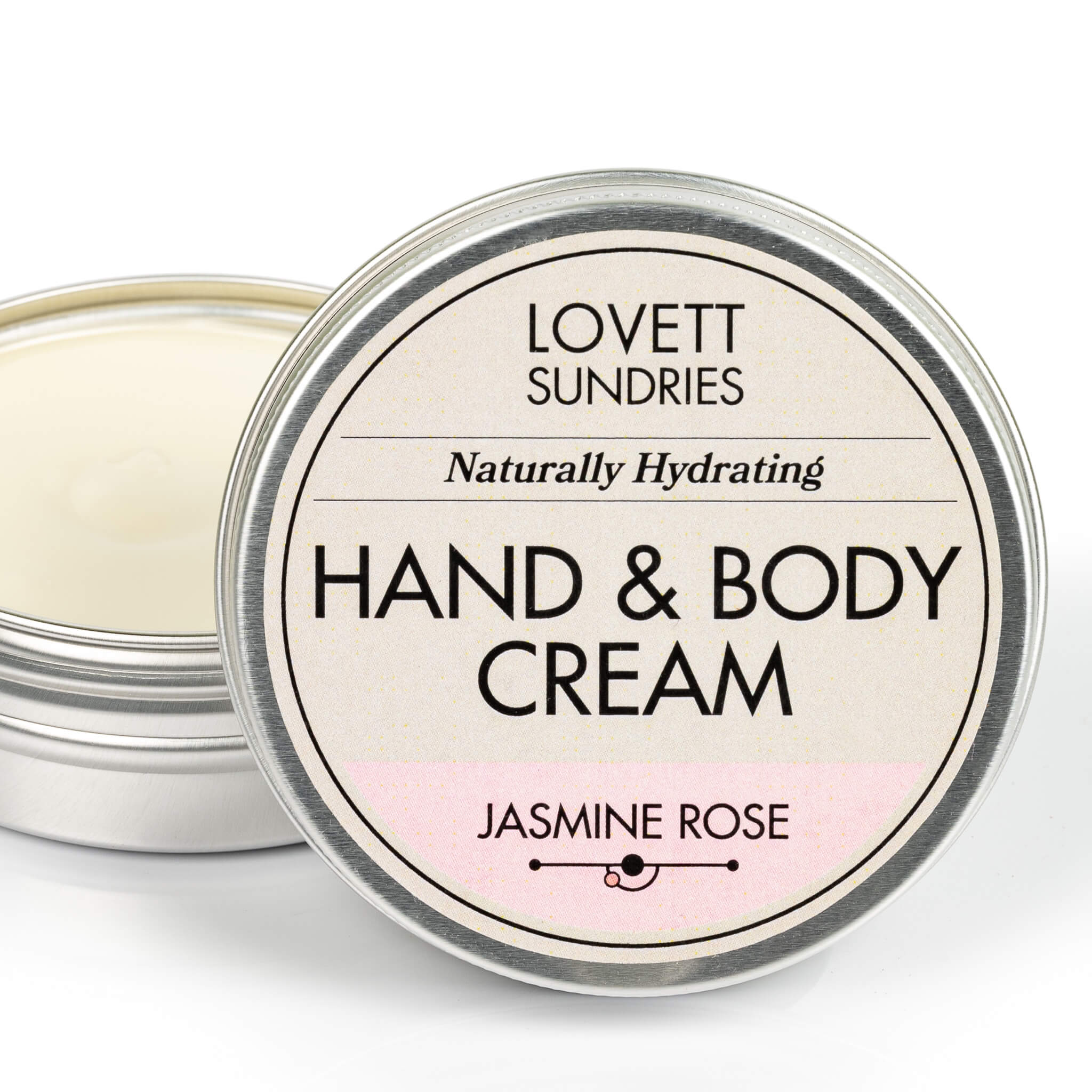 Open tin of creamy all natural hydrating jasmine rose scented travel size hand and body cream. 
