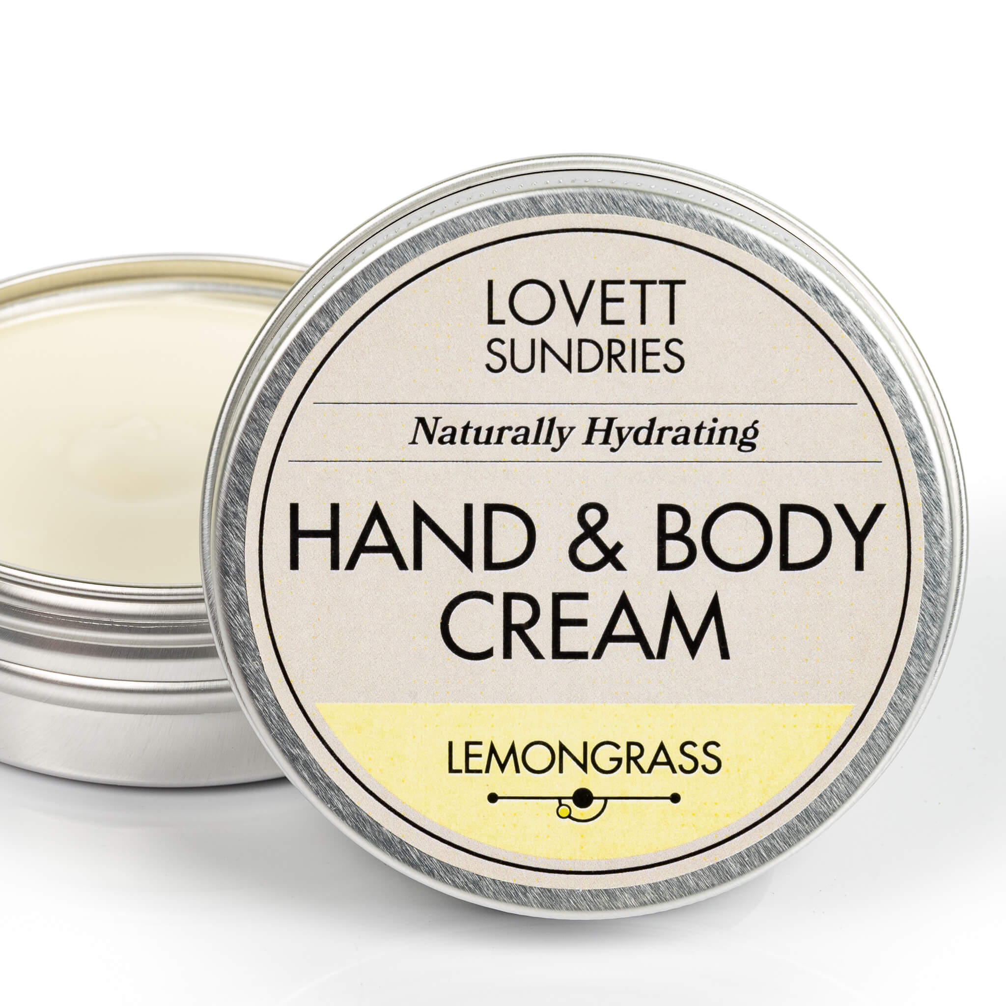 Open tin of creamy all natural hydrating lemongrass scented travel size hand and body cream. 