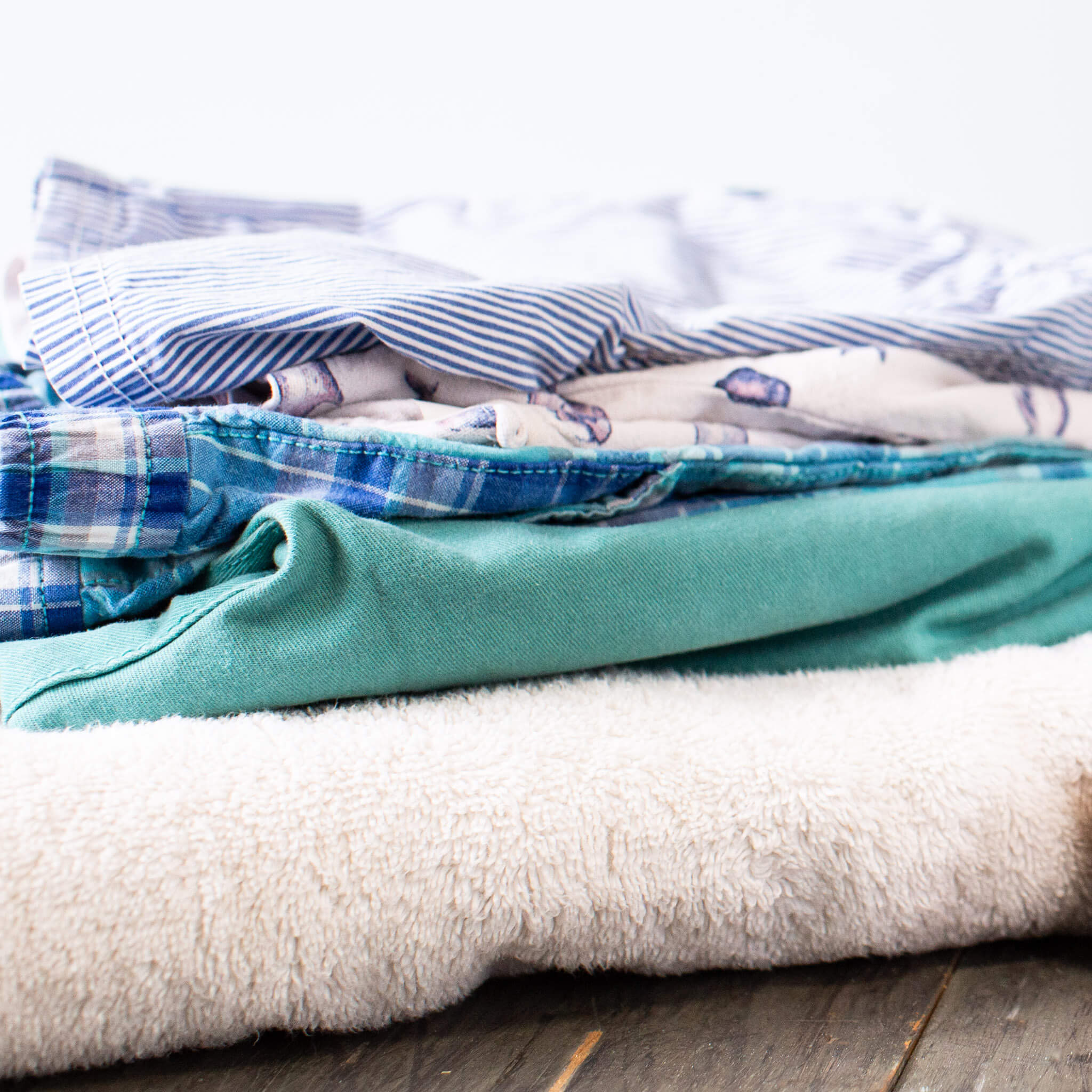 Stack of clean folded laundry.