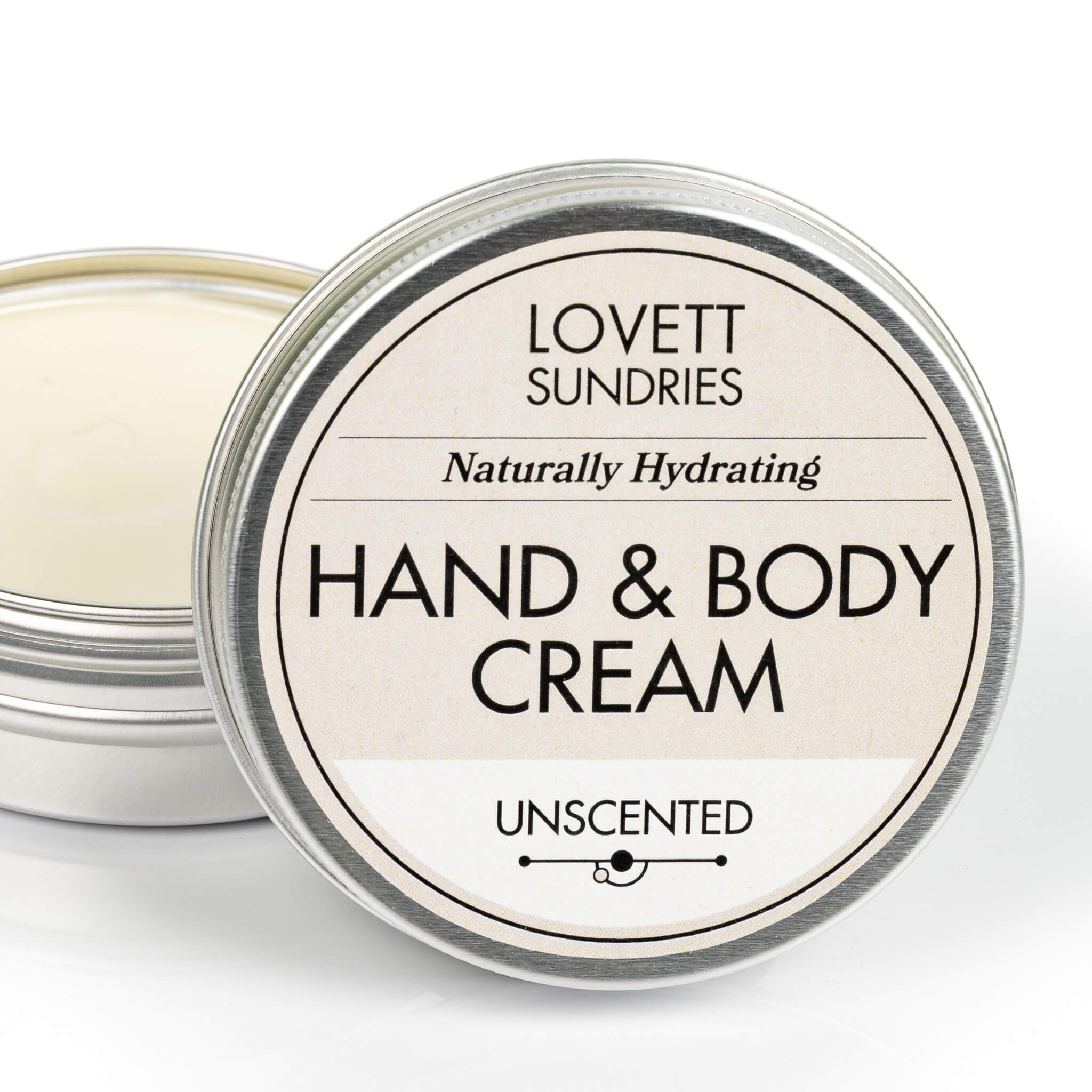 Open tin of creamy all natural hydrating unscented travel size hand and body cream. 