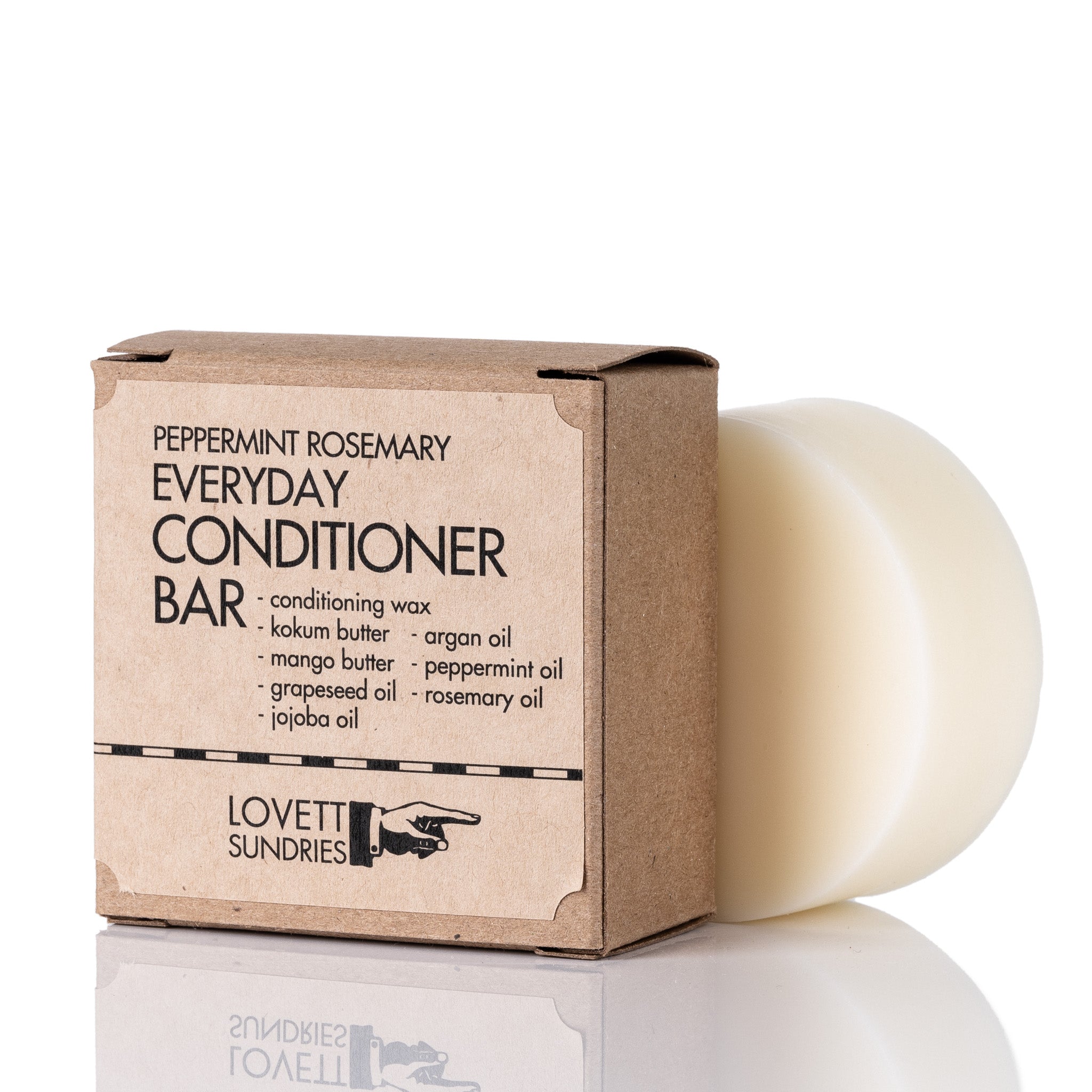 A cardboard container with a peppermint rosemary everyday conditioner bar.